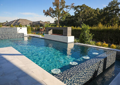 swim up bar with glass tile