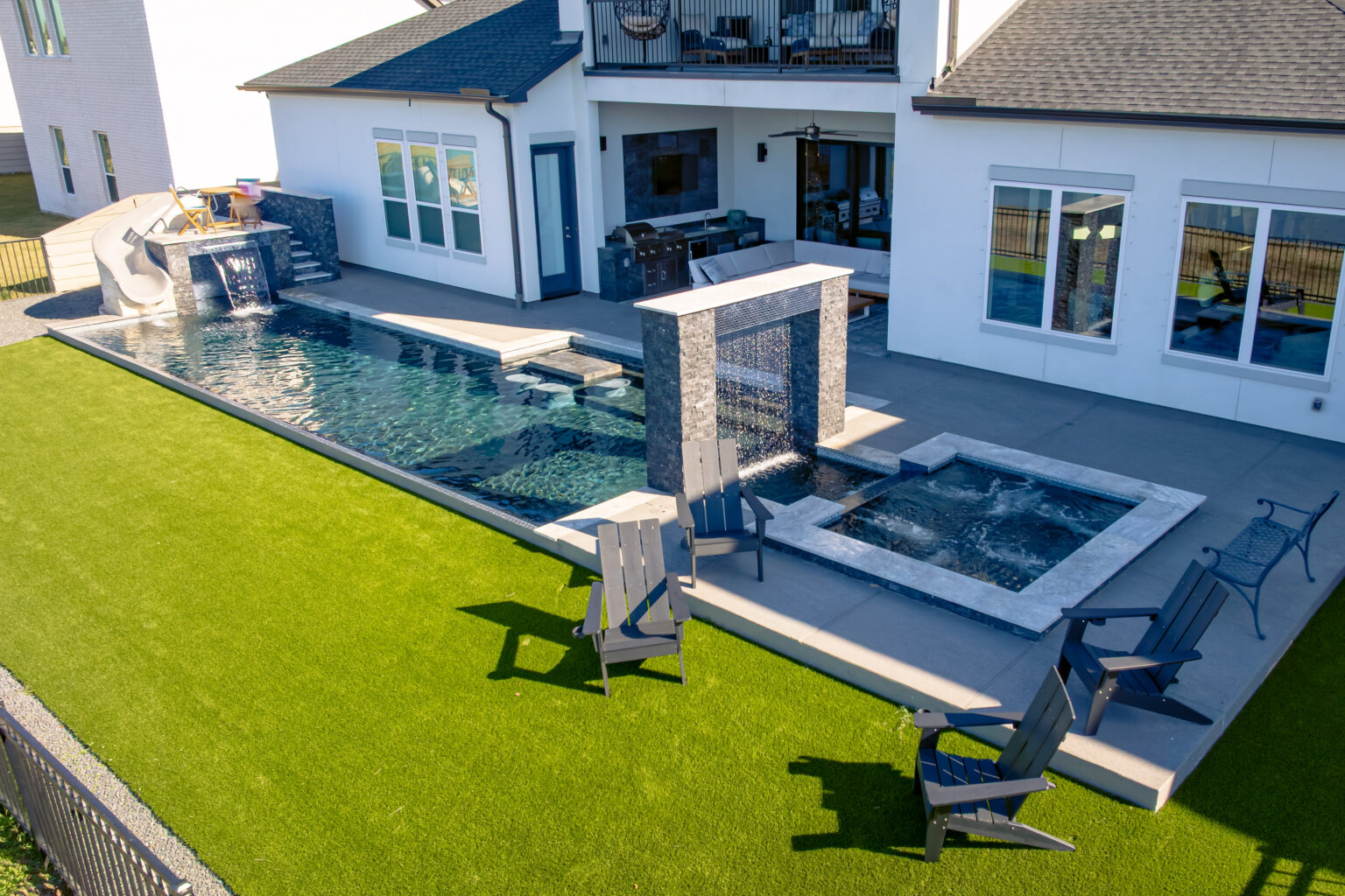 pool with rain descent and grotto