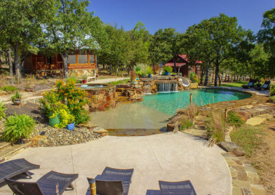 Freeform pool designed to replicate a natural pond or lagoon